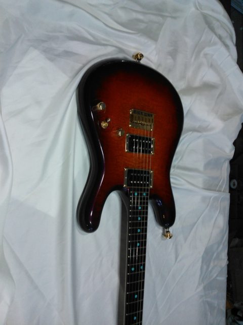 Custom electric guitar, studio photo. Built by William Gelvin, Gelvin Guitars