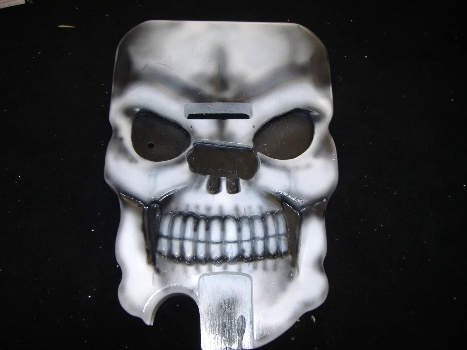 Early carved silver skull guitar body made before Gelvin Guitars