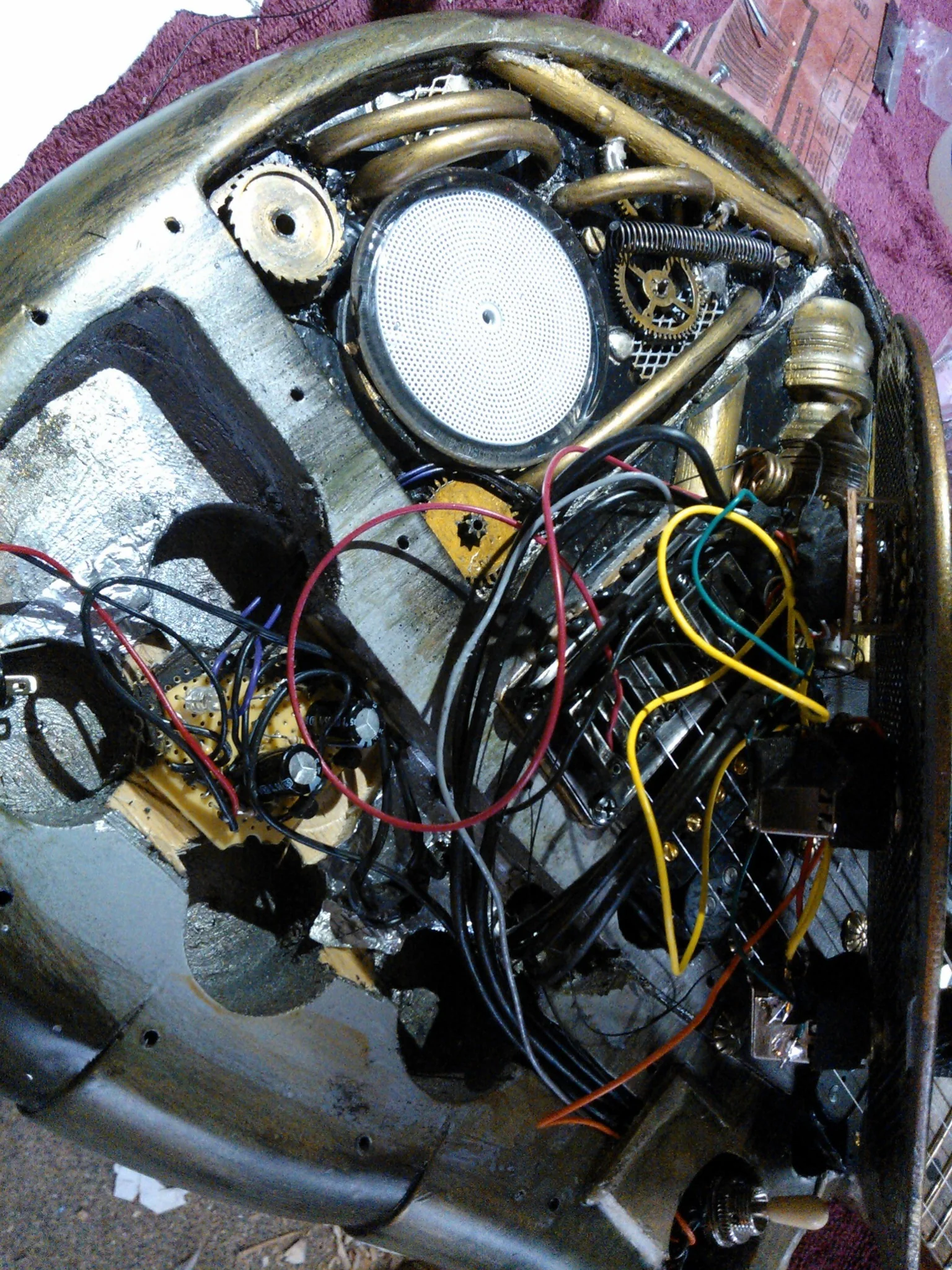 Open internal electronics cavity inside Rayko Dig steampunk guitar