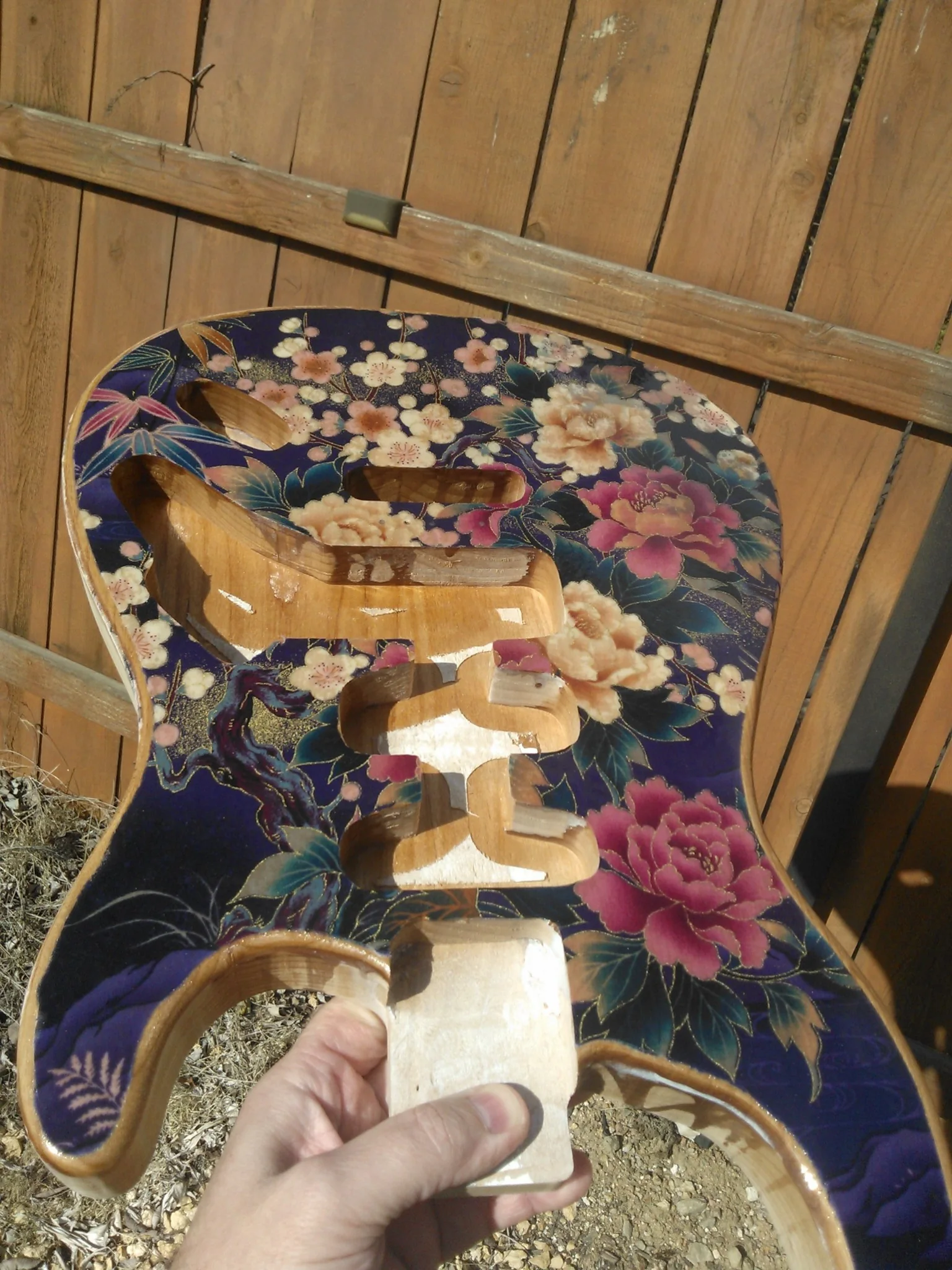 Actual kimono fabric applied to a routed Gelvin Model 2359 guitar body before finishing